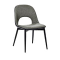 **Chaise moderne en tissu gris avec structure en métal noir**